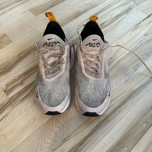 Womans peach and pink Nike air max shoes